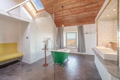 Unrivalled luxury, from twin basins to a clawfoot bath tub with stunning views