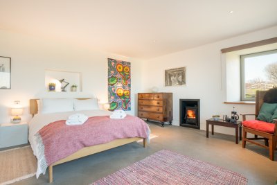 Feature fireplaces and hand-picked soft furnishings add warmth and character