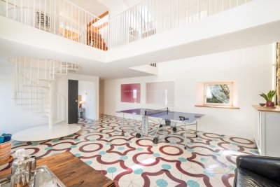 Another look at the games room and striking spiral staircase