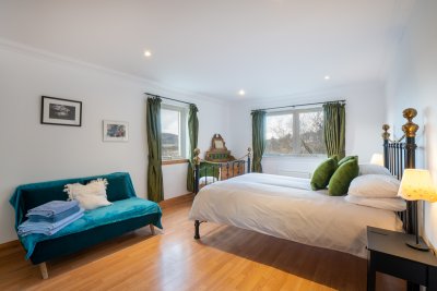 One of three spacious bedrooms, all located on the ground floor