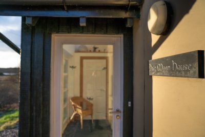 The useful porch offers plenty of space to stow binoculars and boots