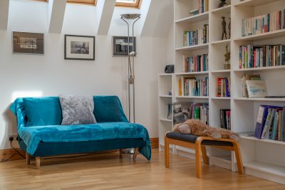 Browse the well stocked bookshelf on rainy days