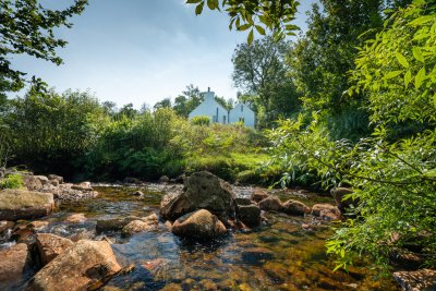 Venture out the back of the cottage to discover the burn and a waterfall