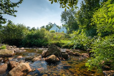 Venture out the back of the cottage to discover the burn and a waterfall