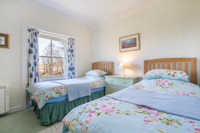 The twin bedroom at Hazelbank features a charming cottage feel