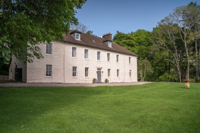 Kilfinichen House stands in beautifully manicured lawns