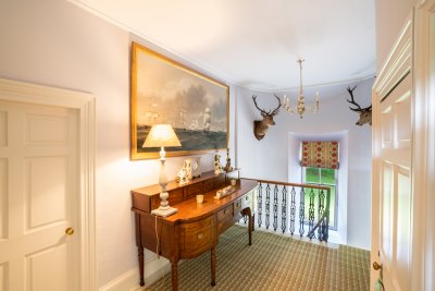 Arriving at the top of the landing, guests are treated to a fantastic display of artworks