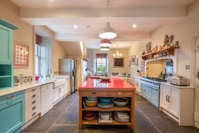A chef's kitchen, complete with a Lacanche range cooker offering exceptional cooking facilities