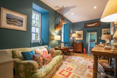 The second sitting room has a cosy, intimate feeling - the perfect spot to put pen to paper, or curl up with a novel