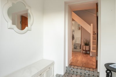 An entrance porch to pull of your layers and boots