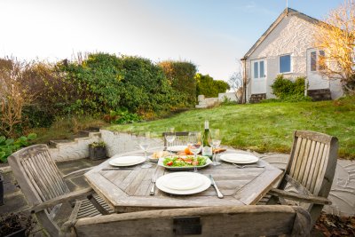 Enjoy alfresco dining in the back garden