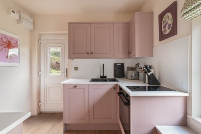 The compact kitchen is well-equipped