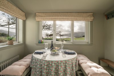 The dining area frames a fantastic view