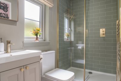 Wash away the elements in the spacious walk-in shower
