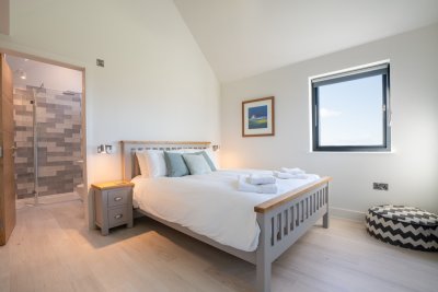 Third king-sized double bedroom on the upper floor, with fitted wardrobes and its own en-suite