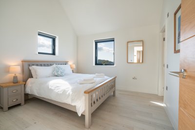 Second king-sized double bedroom ion the upper floor, with fitted wardrobes and en-suite