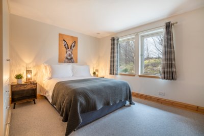 Second double bedroom at Mucmara with inviting soft furnishings and queen-sized bed