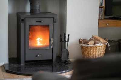 Cosy up beside the wood burning stove after a walk around the waterfall path