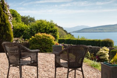 Outdoor seating at the front of the house