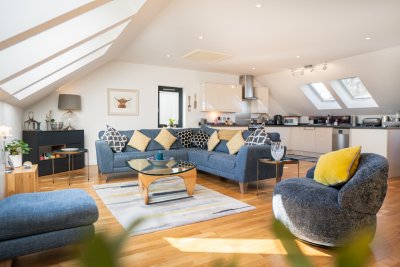 The spacious living area is bathed in natural light