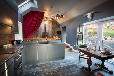 Contemporary kitchen with dining area for two