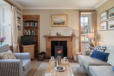 The comfortable living room with artworks adding character