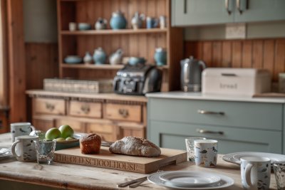 Modern appliances meet character features for a charming effect here