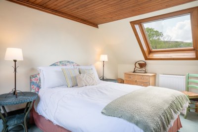 Second double bedroom reached by a spiral staircase from the kitchen