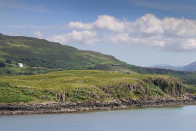 Coastal scenery with Oskamull set up on the hillside