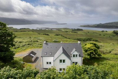 Looking out to sea and outlying isles from Oskamull