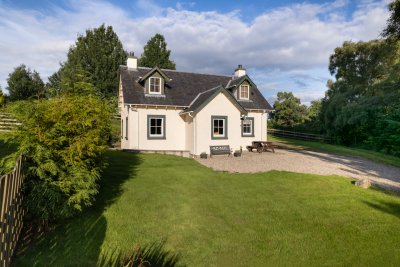 Prairie Cottage, set in a quiet lawned garden