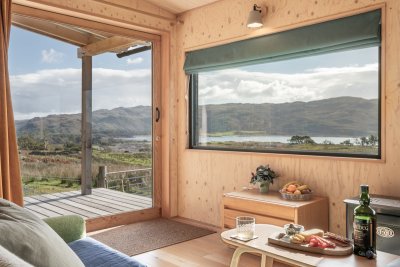 Triple aspect windows fill the cabin with light and bring the outside in