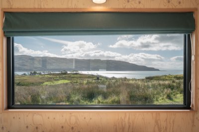 The huge glazed windows capture the ever-changing light and vistas