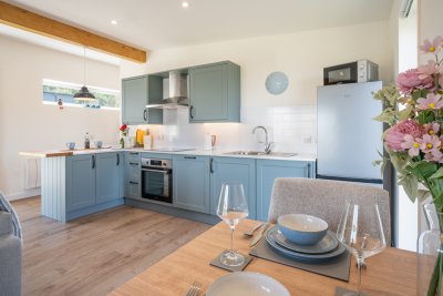 The well-appointed kitchen and dining area feels like a home from home