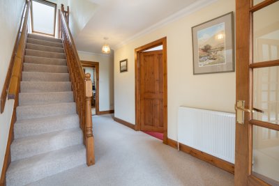 Spacious hallway and staircase at Sallachy