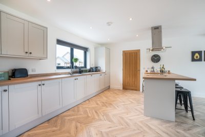 Open-plan kitchen and dining space with island