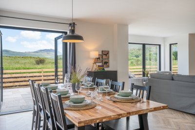 Patio doors lead to the outside dining space