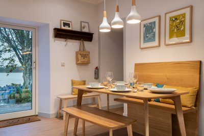 A carefully chosen glass front door makes a feature of the sea view