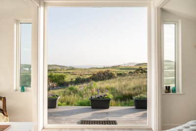 Throw open the patio doors for an unobstructed view to the Sound of Iona
