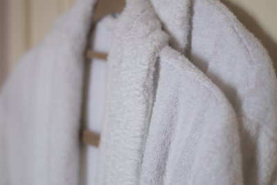 Towelling robes and mules provided for guests