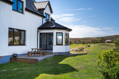 An attractive garden surrounds the cottage