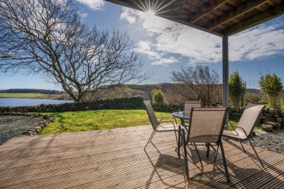 Stunning covered decking area with view off the living room