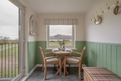 Enjoy the cosy dining nook with lovely views