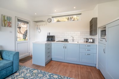 The compact kitchen is well-equipped