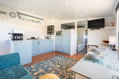 Looking through the Pod's main living area to the bedroom space just beyond