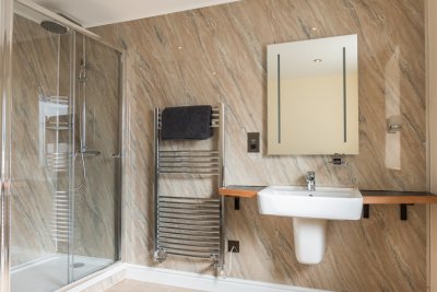 Spacious contemporary bathrooms at The Steading, including this one on the ground floor