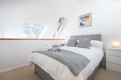 Double bedroom on mezzanine level above the living area