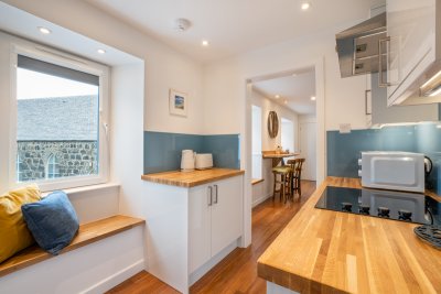 Lots of windows fill the living spaces with natural light