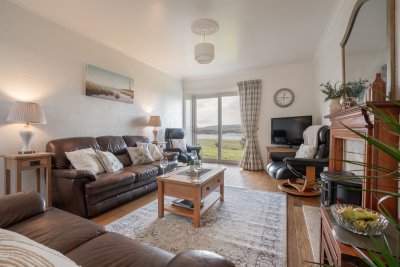 Bright living room with comfortable furniture 