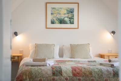 Quilted cover and cosy lighting add to the ambience